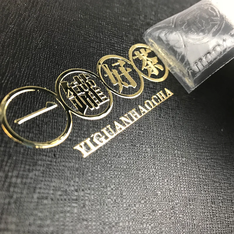 https://ae01.alicdn.com/kf/HTB1cv4yPmzqK1RjSZFLq6An2XXaI/Custom-thin-silver-gold-nickel-stickers-3d-logo-metal-embossed-sticker-with-3M-adhesive-Free-shipping.jpg