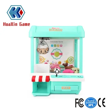 

Mini Candy Claw Machine Toys indoor Arcade Game and Prizes for Boys and Girls with Music Sounds Coin Dolls