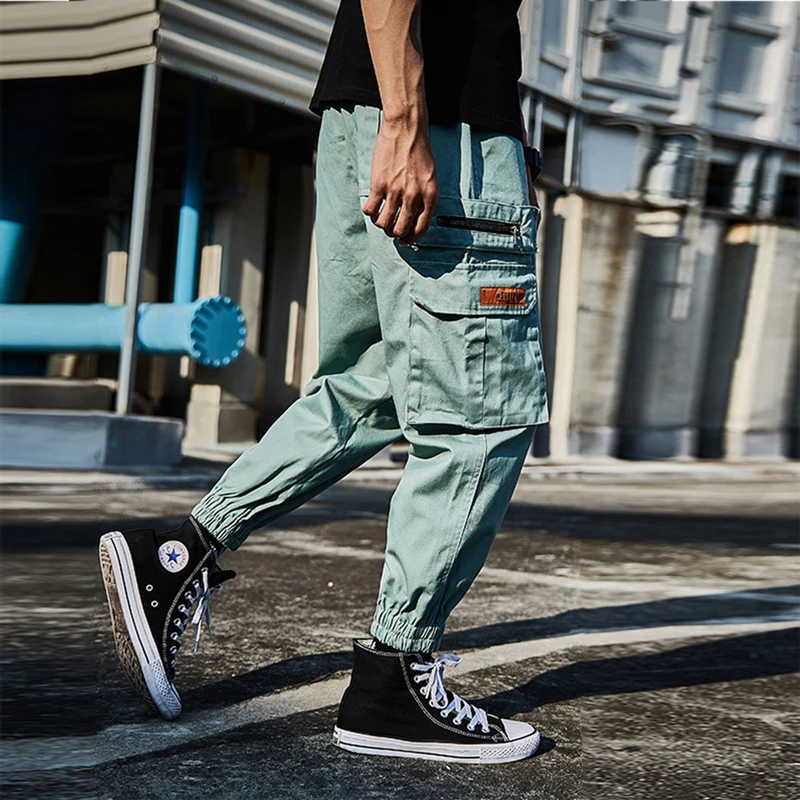 

Fashion Streetwear Joggers Pants Men Loose Fit Big Pocket Cargo Pants Embroidery Designer Slack Bottom Hip Hop Harem Pants