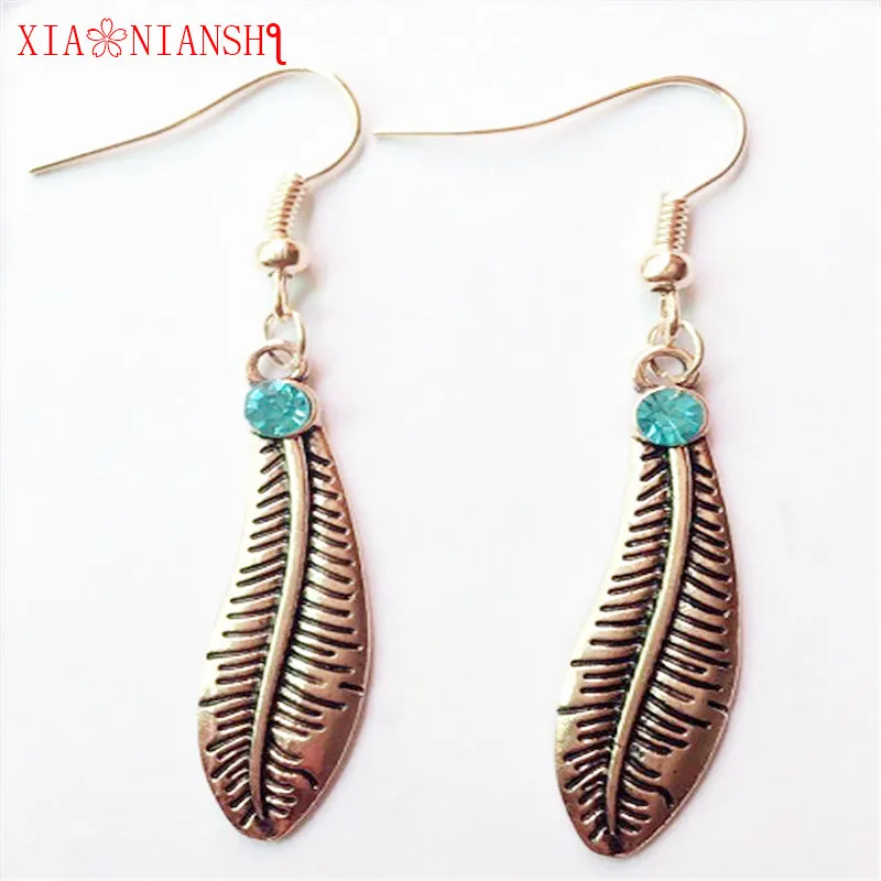 

XIAONIANSHI Gold Silver Color Feather Crystal Stud Earrings, Women Bohemia Vintage Earrings Leaf Drop Pendant Wholesale Jewelry
