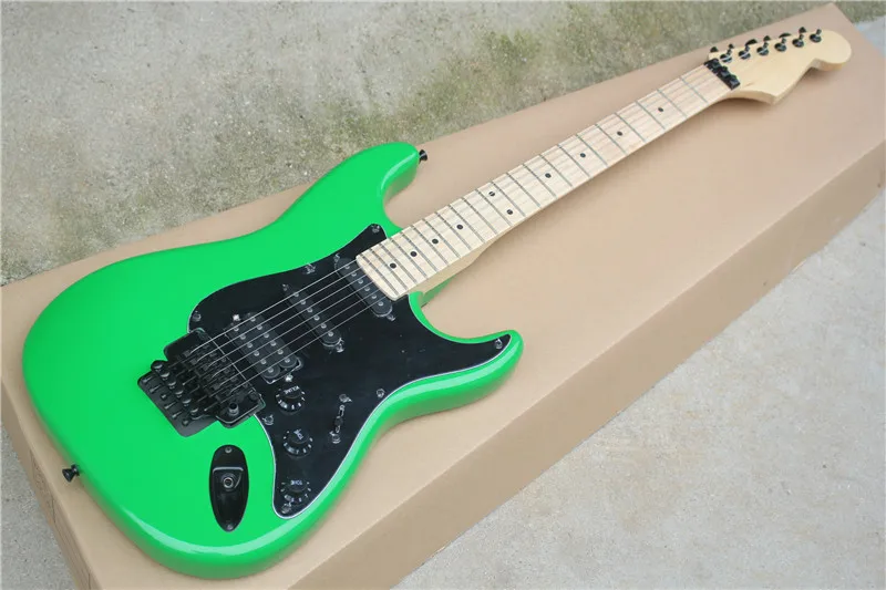 Factory custom tremolo Green Body electric guitar with Black pickguard,SSH pickups,can be customized as request