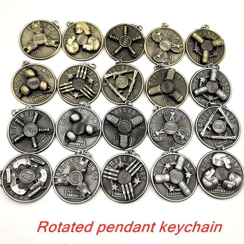 

New Design Rotated PUBG Pendant Keychain 3D Bullet Helmet Gun logo Key Chain Metal Alloy Key Holder High Quality