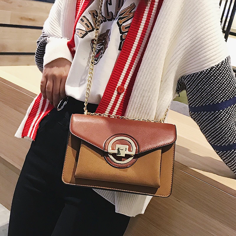 

2018 new Korean version of the wild Messenger shoulder chain fashion lock buckle matte texture small square bag.