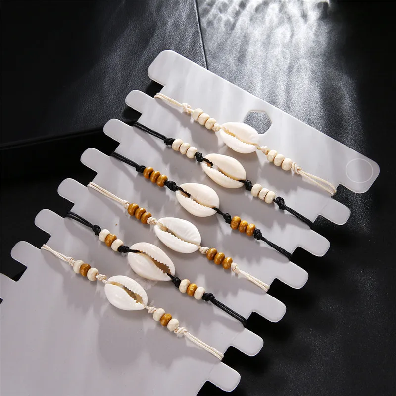 

Bohemian Cowrie Shell Rope Woven Bracelets For Women Sea Shell String Bracelet Adjustable Wooden Bead Hand Bracelet Boho Jewelry