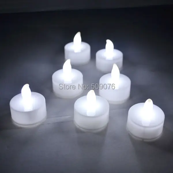

Free shipping 24pcs/lot battery operated candle light LED Candle Light Flameless Romantic Tealight White Wedding Xmas Party
