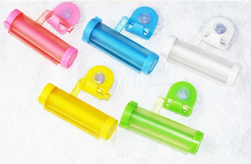 

Creative Rolling Squeezer Toothpaste Dispenser Tube Partner Sucker Hanging Holder