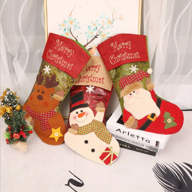 

5 Pcs / Lot New Christmas Gift Bags Santa Claus Elk Snowman Xmas Christmas Stockings Sock Sack Ornaments for home for Tree 2018