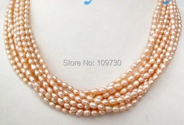 

Jewelry 002858 9 Strands Pink Rice Freshwater Pearl Necklace