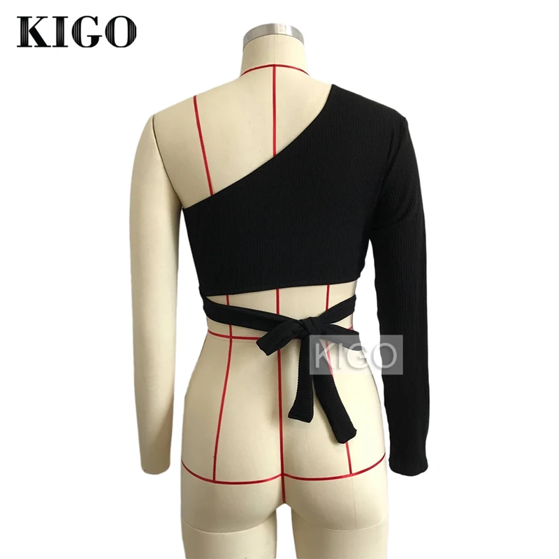 KIGO фитнес женский черный сексуальный топ на одно плечо с длинным рукавом Трикотажный топ со шнуровкой и бантом укороченный топ KH0447H