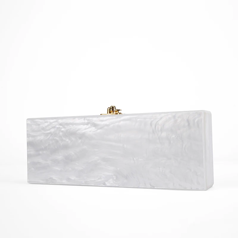 white and gold clutch bag