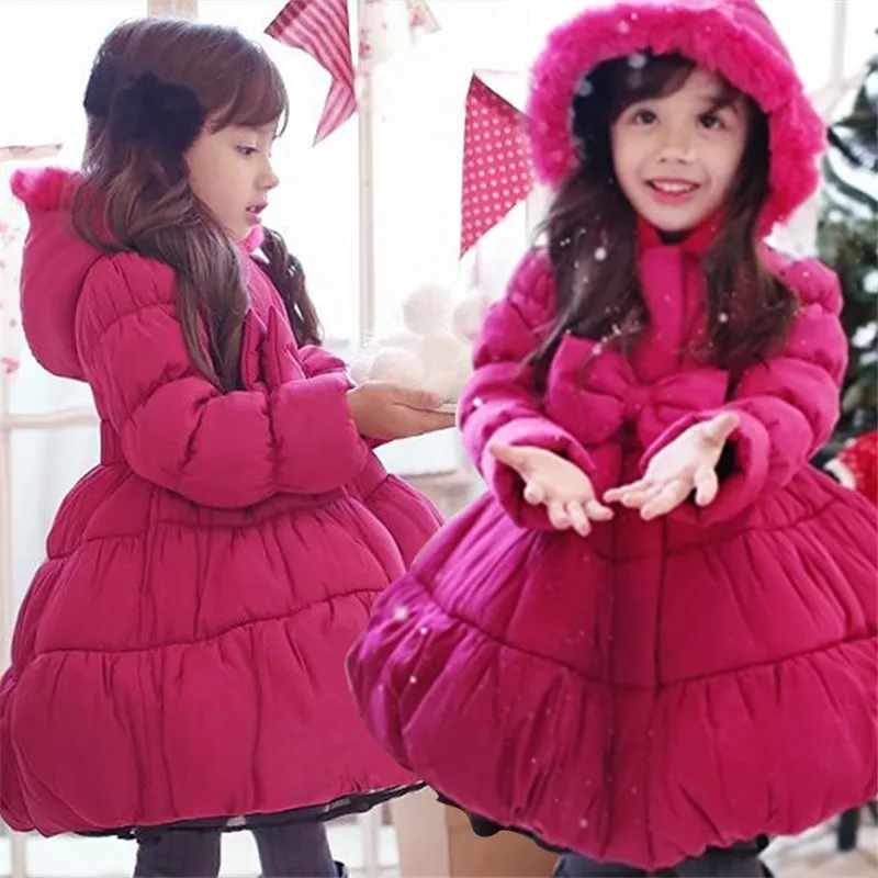 

2018 Christmas Girls Long Coat Big Bow Collect waist hooded girl winter clothes Grow a coat of the girls in new year