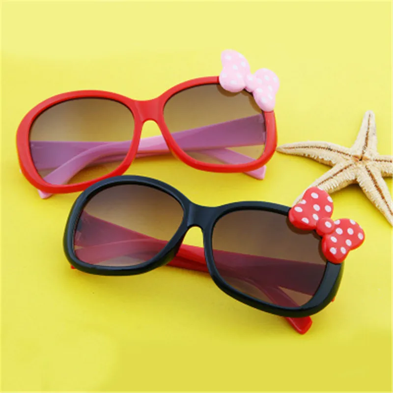 boys and girls cat eye Kids sunglasses new high-end fashion brand children's goggles bow color children's glasses UV400