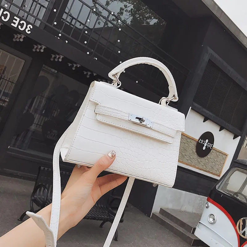 

2019 New Tide Girl Bao fashion Shoulder bag hand-held oblique Baukeli bag Autumn women's bag