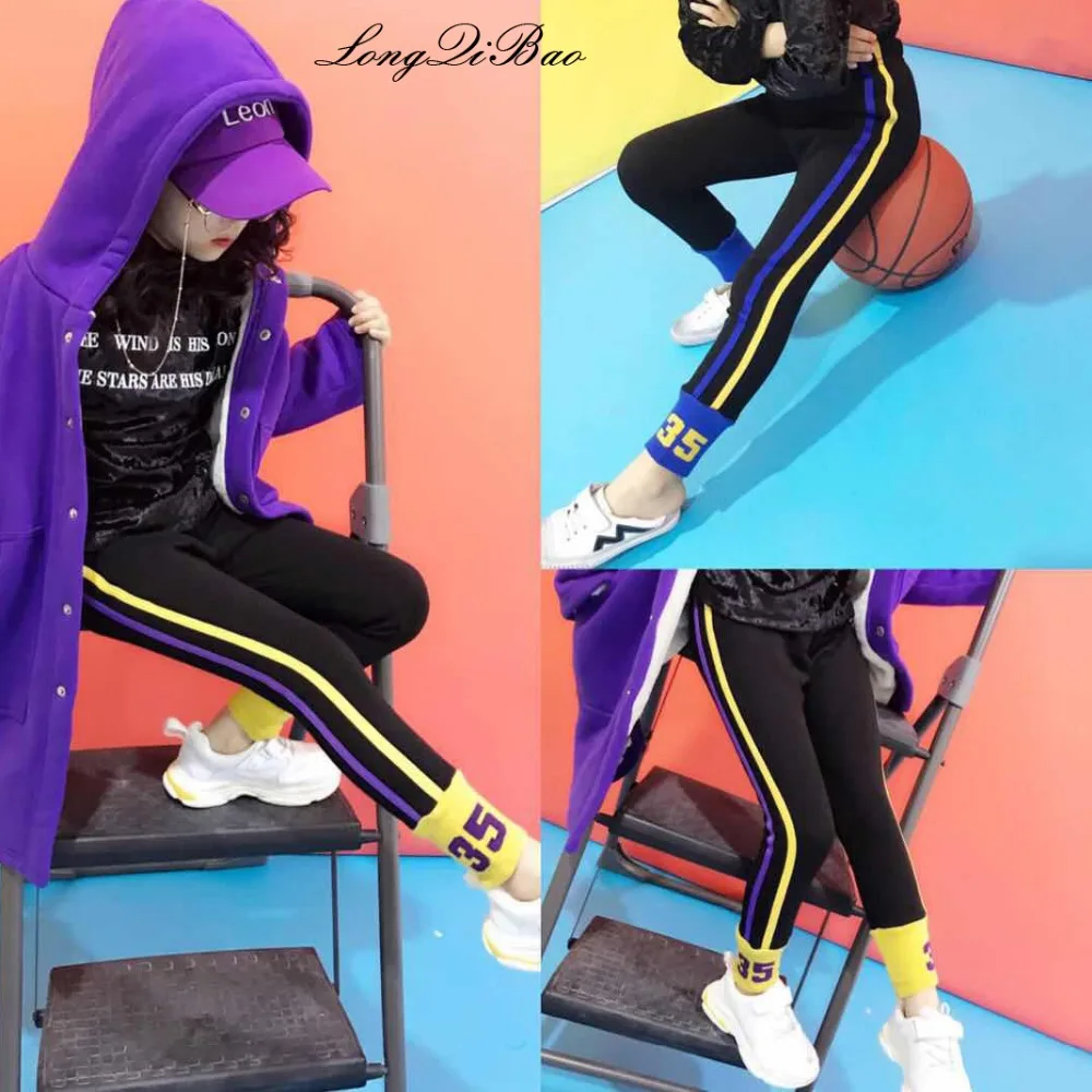 

Baby girl plus velvet pants 2018 winter new big children children Korean fashion striped foot letter leggings tide