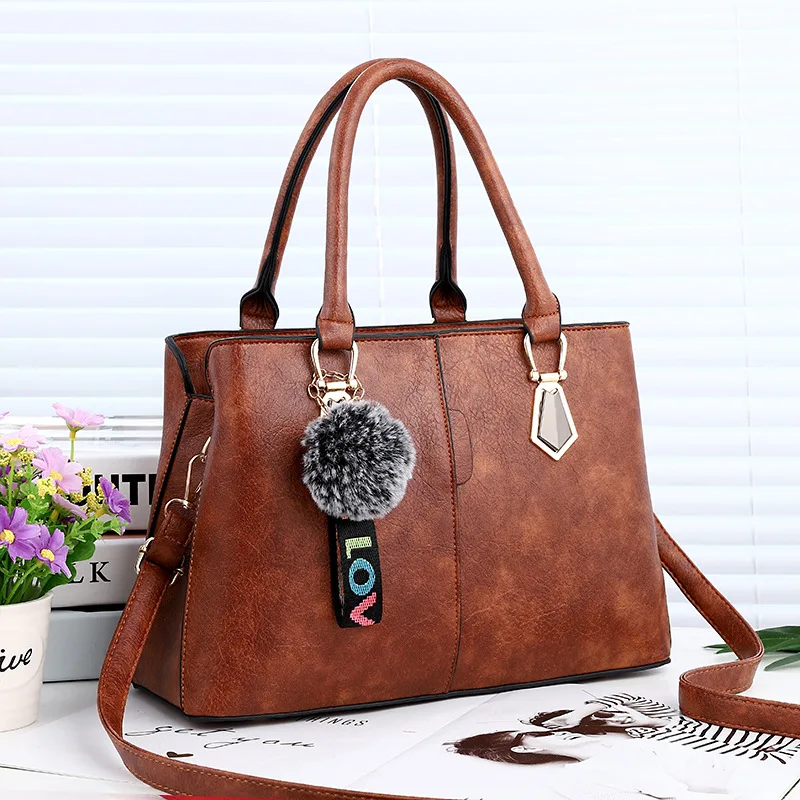 حقيبة يد حقيبة الكتف للسيدات من جلد بلوتونيوم عارضة كبيرة قدرة أعلى-مقبض دلو حقيبة أسلوب بسيط الصلبة اليد 2019 جديد