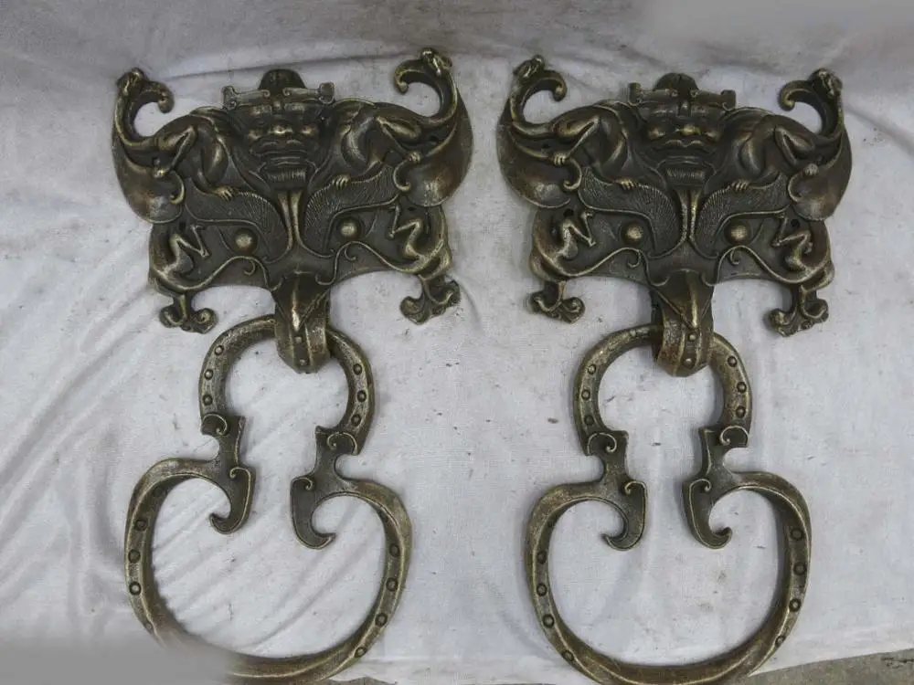 

Fine bronze sculpture China carved copper dragon and buddha knocker pair Statue