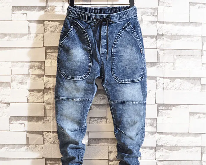 Idopy Spring New Men's Elastic Jeans Fashion Casual Hip Hop Loose Denim Jeans Black Blue Trousers Harem Pants Denim Joggers