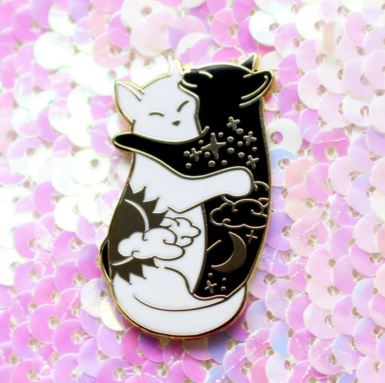 

Cute day and night hugging cat enamel pin