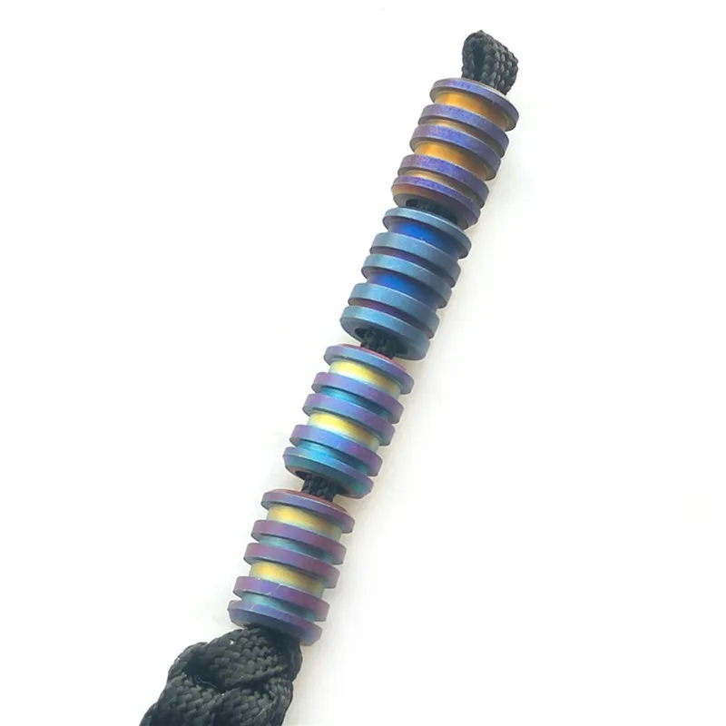 سبائك التيتانيوم tc4 حبات paracord حبل سقوط الأدوات أدوات التخييم متعددة قلادة الهاتف