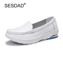 Новая Белая обувь медсестры Обувь Лидер продаж Пояса из натуральной кожи Для женщин Повседневное Slip-On белые туфли Удобная женская обувь на плоской подошве из коровьей кожи Лоферы для женщин