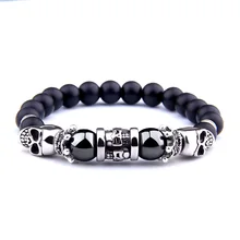 Serie de calaveras pulsera con cuentas negras Hematita Natural gemas de moda de la cabeza del cráneo cuentas de piedra Onix encanto de la pulsera de los hombres