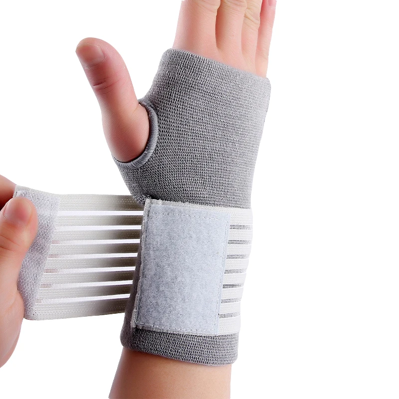 

1 piece Free Size elastic sports safety carpal tunnel tennis wrist bandage brace support palm pad 4 colors