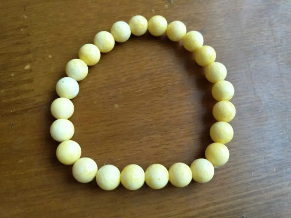 

New Fashion 8mm yellow Tridacna Round elastic bracelet 7 '' 0326 28%