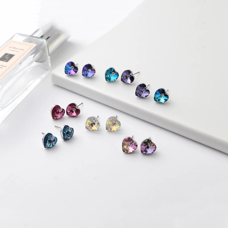 Женские серьги гвоздики с кристаллами Swarovski классические серебряного цвета в