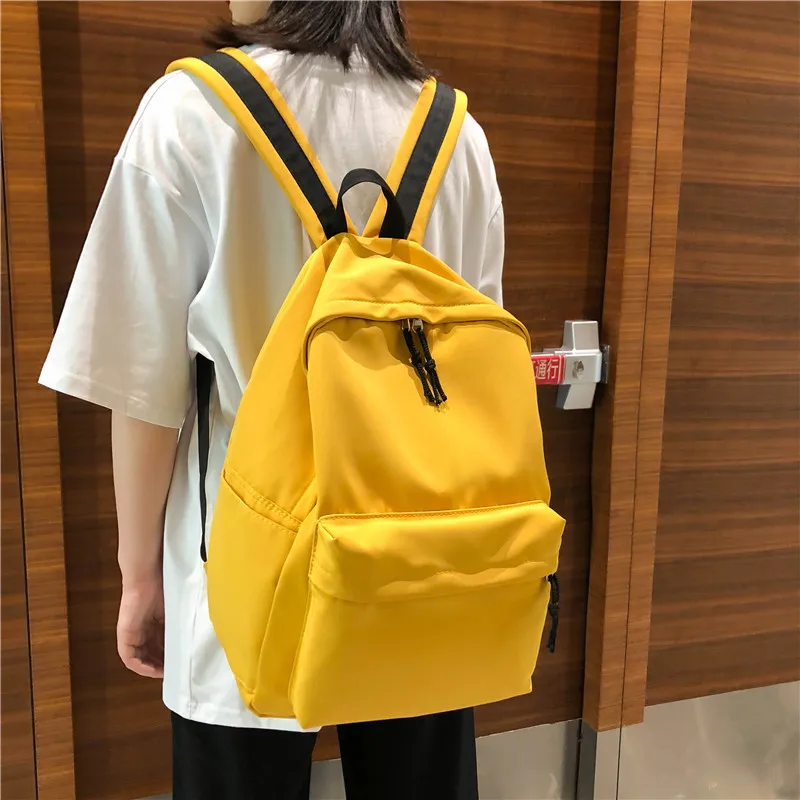 

DCIMOR New Pure color waterproof nylon Women Backpack Female High quality schoolbag for Teenage girls Travel Backpack Mochila