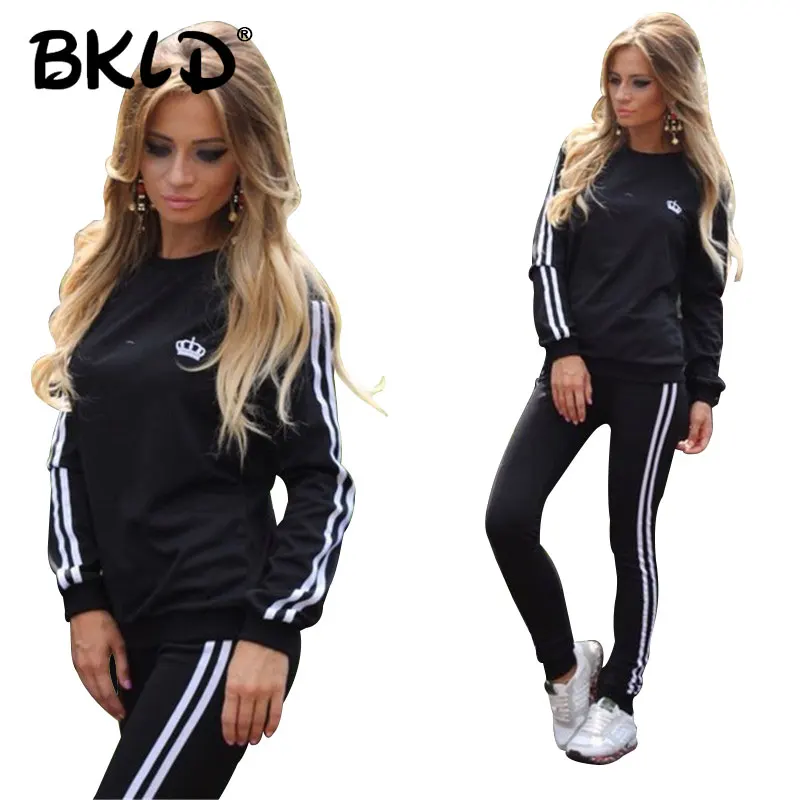 BKLD الربيع 2019 عارضة رياضية النساء 2 قطعة مجموعة بلوزات وسراويل الجانب مخطط ولي مطبوعة مثير الملابس للنساء جرزاية BKLD الربيع 2019 عارضة رياضية النساء 2 قطعة مجموعة بلوزات وسراويل الجانب مخطط ولي مطبوعة مثير الملابس للنساء جرزاية