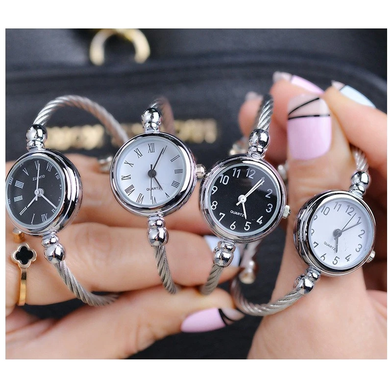 Unique femmes Bracelet montre petit cadran lisse haut de gamme argent mince Bracelet coréen rétro Art femme horloge Quartz montre cadeau heure