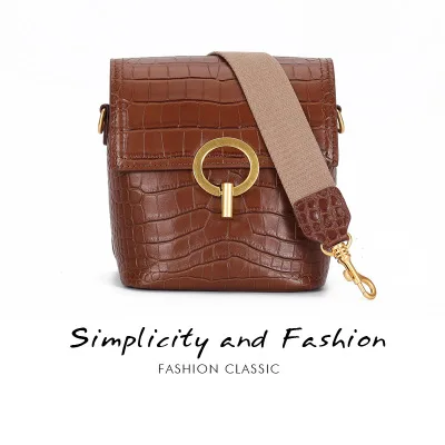 

Leather handbag spring and summer new wide shoulder strap portable diagonal cowhide bucket bag shoulder Messenger bag