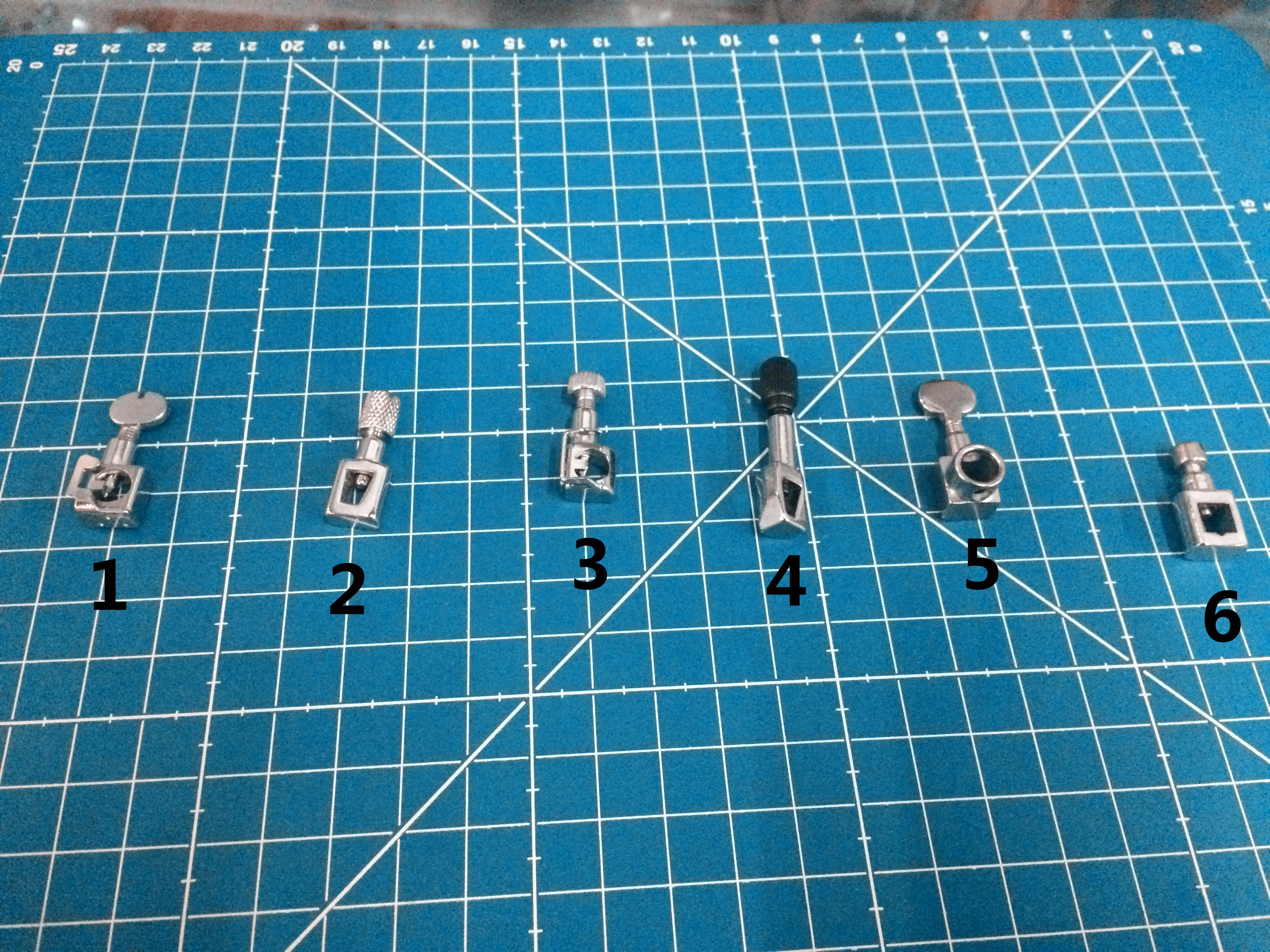 HOME SEWING MACHINE. NEEDLE CLIP AND SET SCREW SEWING MACHINE NEEDLE