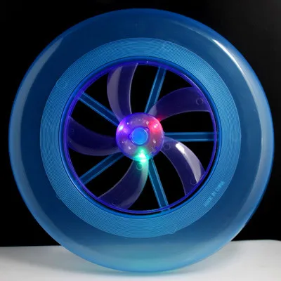 Flying saucer frisbee colorful lights rotating fly...