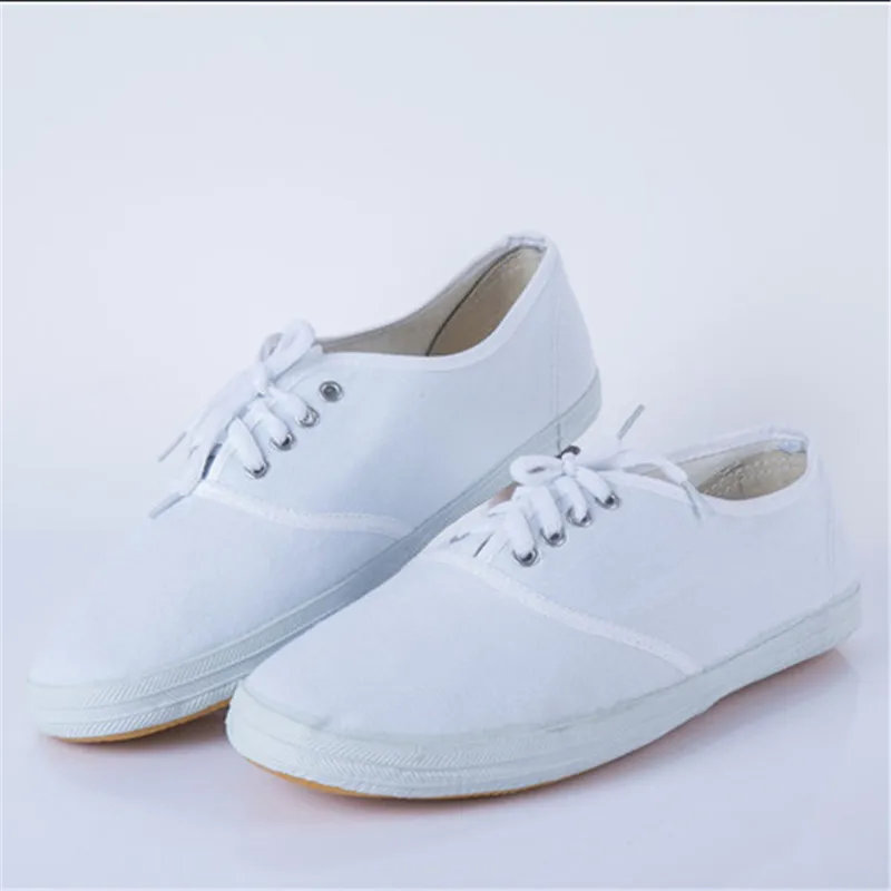 flat white canvas shoes