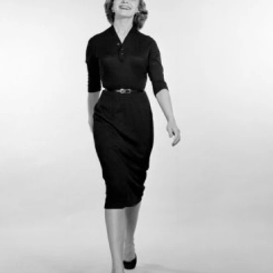 Young woman wearing elegant dress smiling Poster Print (18 x 24)
