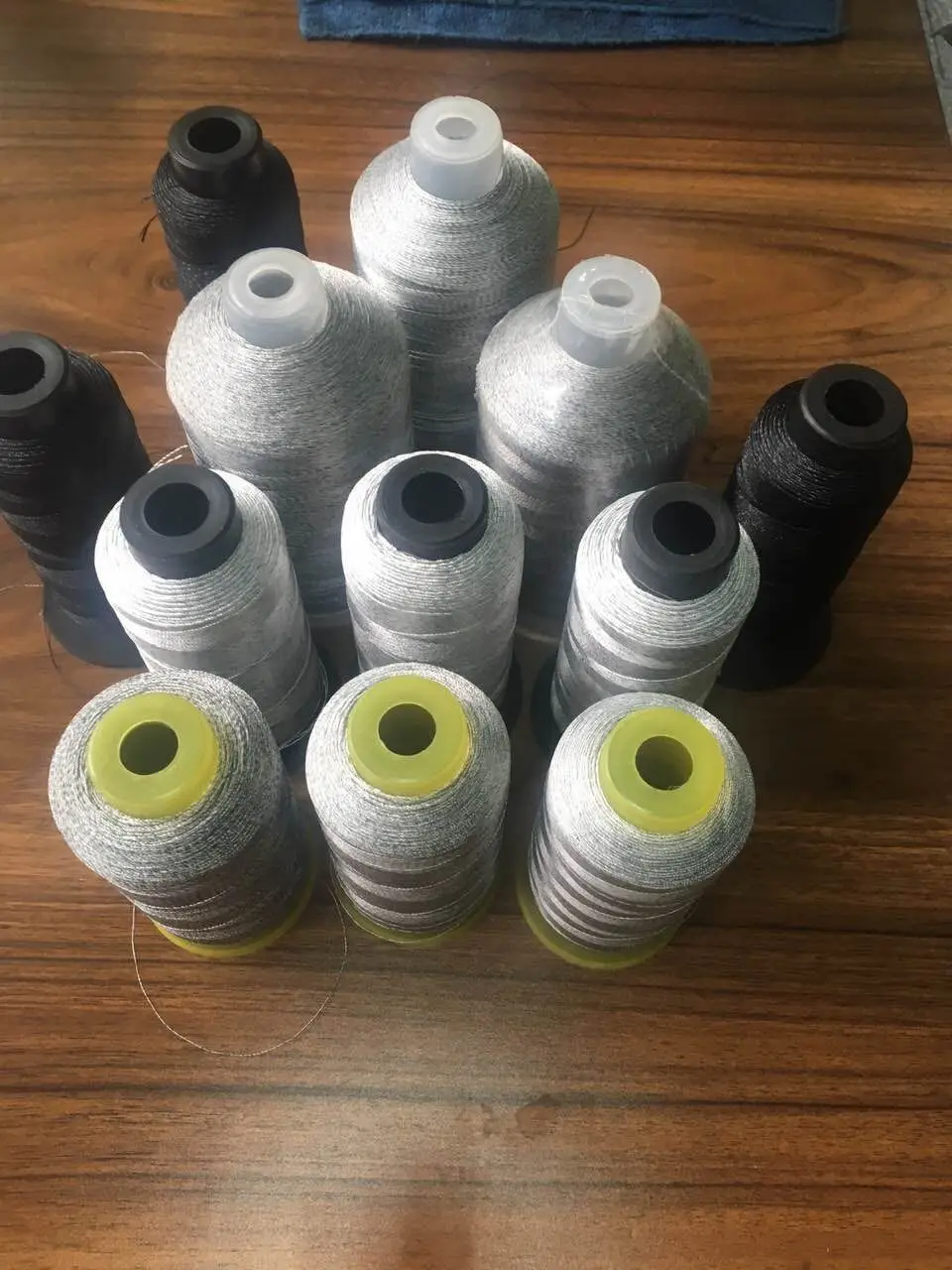 

Gray conductive permanent anti-static sewing thread