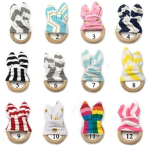 

Novelty Wooden Baby Teether Develop Intelligence Baby Grasping Toy Soft Rabbit Ears Handbell Infant Rattles Educational Toys