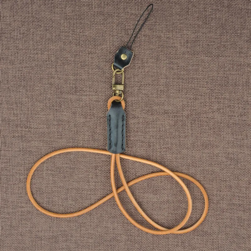أعلى درجة اليدوية جلد البقر الحبل للهواتف المعادن مفتاح سلسلة أحزمة هاتف المحمول USB شارة حامل DIY شنق حبل الحبل أعلى درجة اليدوية جلد البقر الحبل للهواتف المعادن مفتاح سلسلة أحزمة هاتف المحمول USB شارة حامل DIY شنق حبل الحبل