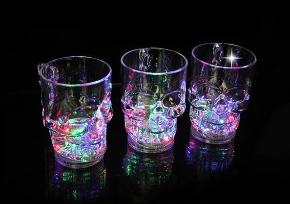 

8.5*12*6.4cm New Transparent Water Inductive Glowing Whiskey Wine Vodka Beer Cup Mug LED Glowing Skull Shape Cup Drinking Ware