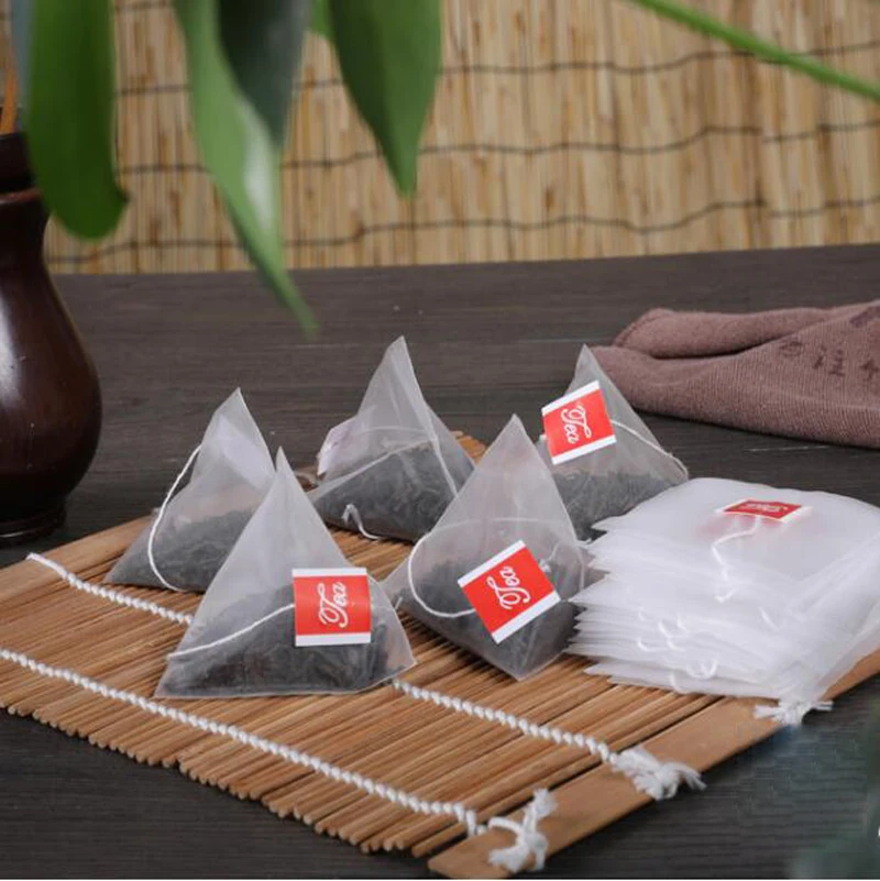 

10000Pcs/Lot New Pyramid Nylon Tea Bags Empty Transparent Teabags With String Filter Tea Bag
