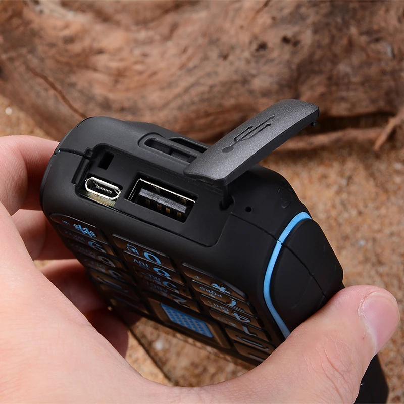 KUH المصباح المزدوج FM 15800 mAh طويل الاستعداد الطاقة البنك وعرة في الهواء الطلق الهاتف ضد الصدمات المزدوج سيم صوت كبير الهاتف المحمول P035