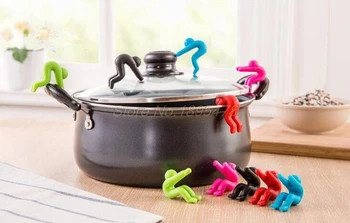 

100PCS New Creative Cooking Tools pot cover heightening Spill control silicone Little people modelling prevent bop overflow