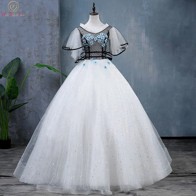 

White Quinceanera Dress Illusion Floor Length Ball Gown V-neck Short Ruffles Sleeves Lace-up Sequined Tulle Appliques Beading