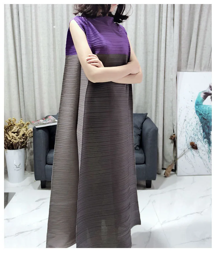 

Summer 2009 New Sanzhai Fold Fashion Colourless Sleeveless Dinner Dresses Show Temperament Long Dresses