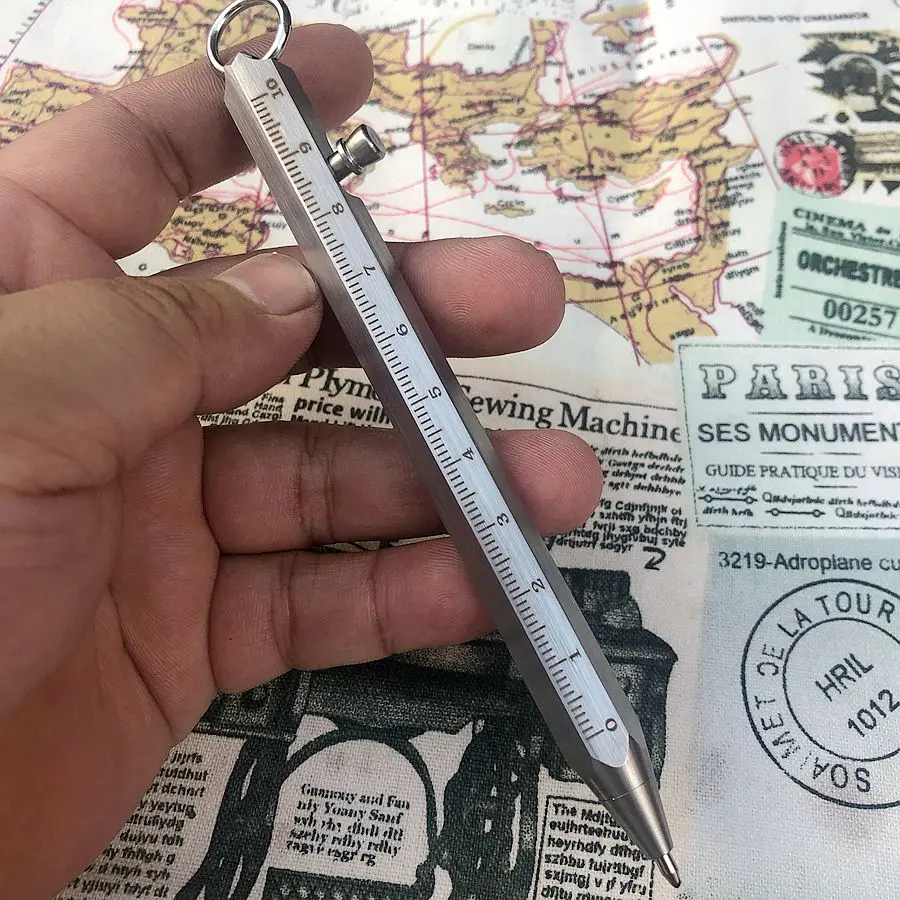 

Multifunction Outdoor Travel Kit Tools EDC Six Prismatic Stainless Steel Pen Dividing Rule Bolt Type Tactical Ballpoint Pen