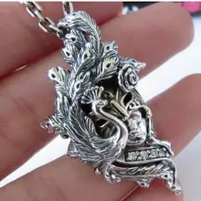 Японская уличная посуда серебро 925 пробы кулон, подвеска павлин