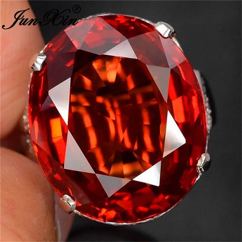 

JUNXIN Large Red Stone Oval Big Rings For Women 925 Sterling Silver Filled Egg Zircon Wedding Ring Female Birthstone Jewelry CZ