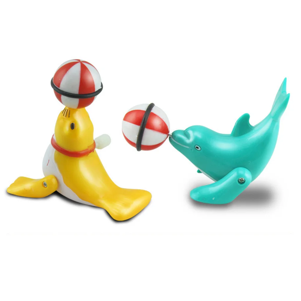 

Children's Wind-up Toy Dolphin Top Ball 360 Degree Rotation Fun Dolphin Modelling Circus Clockwork Toy