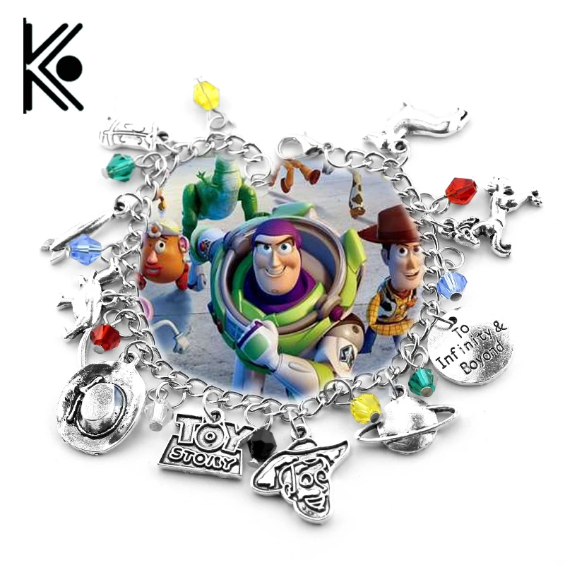 

Free shipping Toy Story 3 jewelry Charm Bracelet Buzz Lightyear Woody Jessie dinosaur hat Accessories jewelry girl's gift